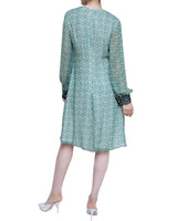 Mikael Aghal(ミカエル アグハール)のひざ丈ドレス結婚式やパーティーにぴったりのレンタルアイテム。